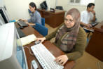Palestinian women working in offices photos